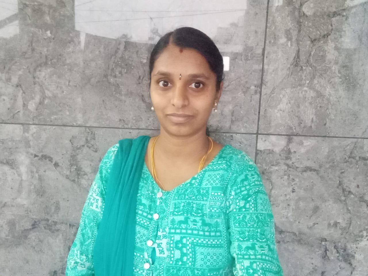 Dr. Nithya R
